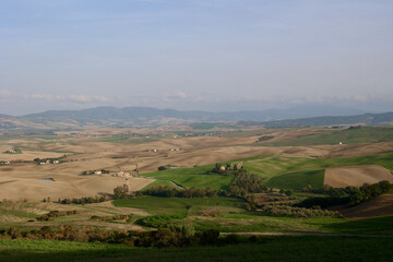 Fototapeta premium A panoramic view over the hills of Tuscany in autumn, Italy.