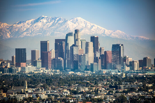 Smoggy Los Angeles with snow capped mountains