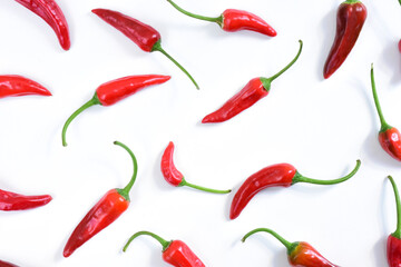 Hot chilli peppers pattern. Cayenne peppers isolated on white background. 