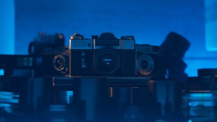 Vintage collection of antique cameras and lenses. Immerse yourself in an atmosphere of mystery and...