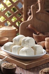 white tofu on wooden table