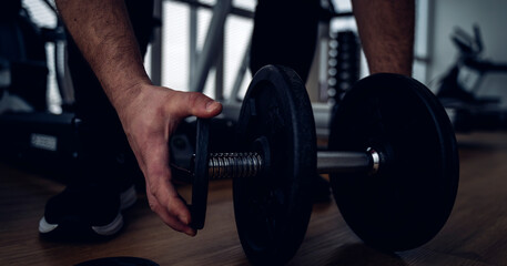 dumbbells and exercise equipment in the gym