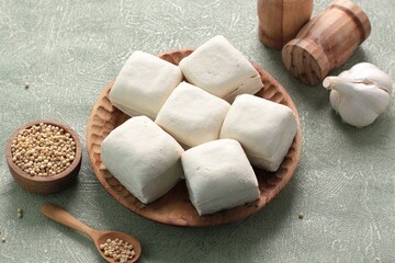 white tofu on wooden table