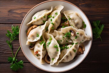 Delicious Overhead view of pierogi dumplings with mushrooms in bowl