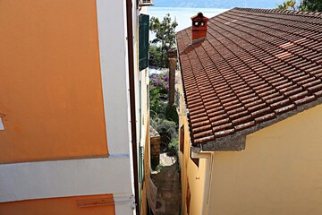 Very narrow passage between houses in the old town of Herceg Novi