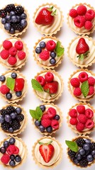 Beautiful set of delicious sweet tartlets with fresh berries on a white background, top view. Banner design, vertical photo - obrazy, fototapety, plakaty
