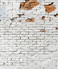 Background of old vintage dirty brick wall with peeling plaster.