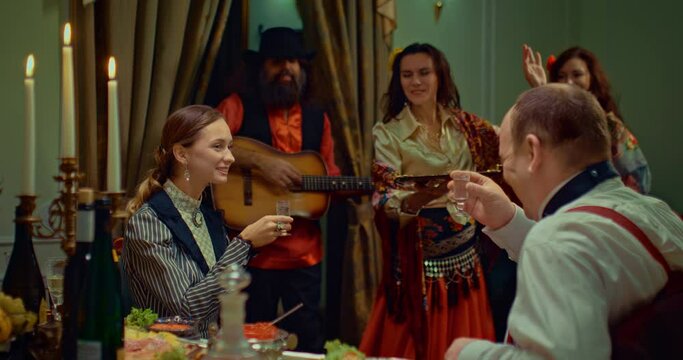 man and woman drinking vodka in restaurant in 19 century, 4K, Prores