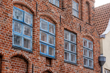 Fototapeta na wymiar Old town in the hanseatic city of Lübeck with historic buildings