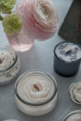 Candles with lavender and flowers in the interior