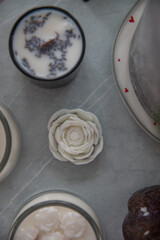 Candles with lavender and flowers in the interior
