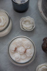 Candles with lavender and flowers in the interior
