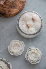 Candles with lavender and flowers in the interior