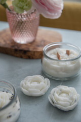 Candles with lavender and flowers in the interior