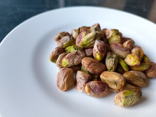 Pistachios on a White Plate