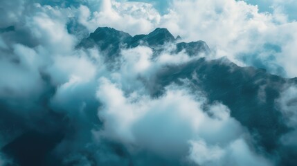 A plane soaring through the clouds above a majestic mountain range. Perfect for travel and adventure themes
