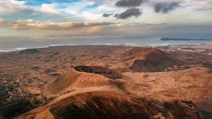 Aerial view from above of the Calderon Bayuyo and Calderon Las Calderas. These little-known volcanoes are found in the sland of Fuerteventura, Canary Islands.