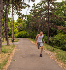 Young man jogging in the park.Healthy lifestyle.