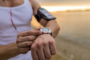 Runner in the park using smart watch