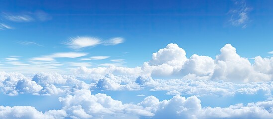 White clouds in the blue or azure sky a captivating vision of boundless serenity and beauty This stunning image transports you to a world of tranquility. Creative Banner. Copyspace image