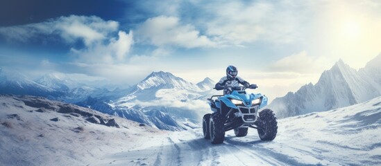 Quad bike rides on white snow in winter Sport. Creative Banner. Copyspace image - obrazy, fototapety, plakaty