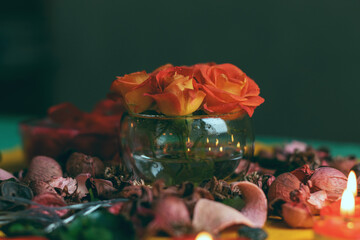 Bouquet of roses, candles and gifts, card for February 14, St. Valentine, March 8, wedding, birthday, mother's day, blurred background, bokeh.