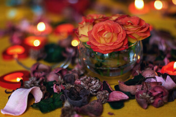 Bouquet of roses, candles and gifts, card for February 14, St. Valentine, March 8, wedding, birthday, mother's day, blurred background, bokeh.