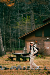 Asian woman person in nature forest portrait concept, attractive young female asian pretty girl with beautiful face are happy and joy outdoor lifestyle at tree park background, summer travel vacation