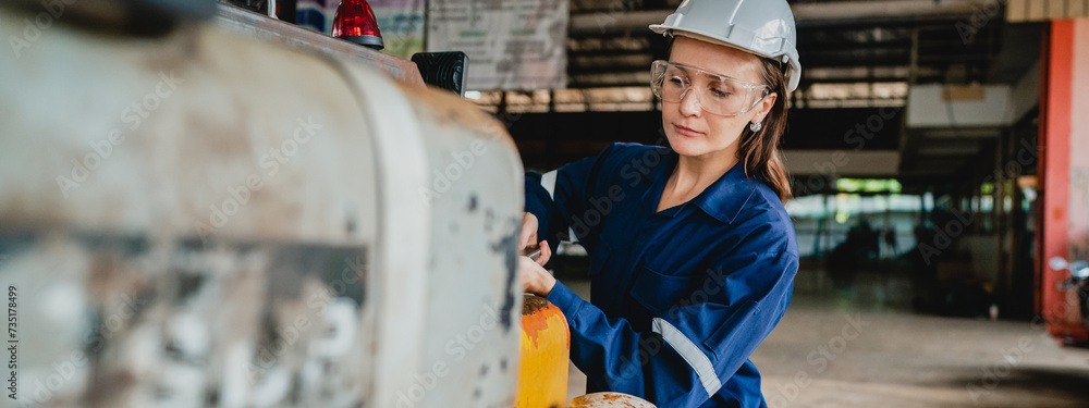 Wall mural professional technician engineer maintenance working on industry production control system service, 