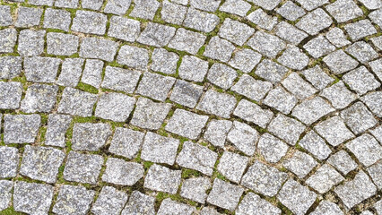 Cobblestone pavement texture background. Cobblestone pavement background.