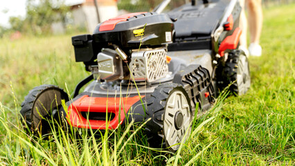 lawn mower on a mowed lawn