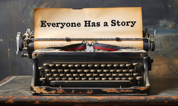 Vintage typewriter with a sheet of paper that reads Everyone Has a Story', evoking the universal nature of storytelling and personal narratives