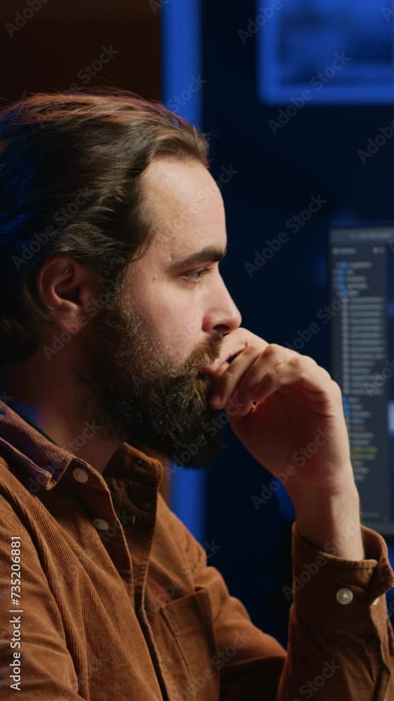 Poster programmer using computer to update artificial intelligence neural networks, drinking coffee and wri