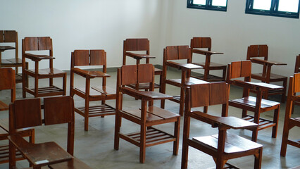 old wooden chairs in the classroom
