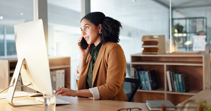 Woman, computer and phone call as receptionist for client consulting or online booking, information with smile. Female worker, communication or talking in office for service, helping or appointment