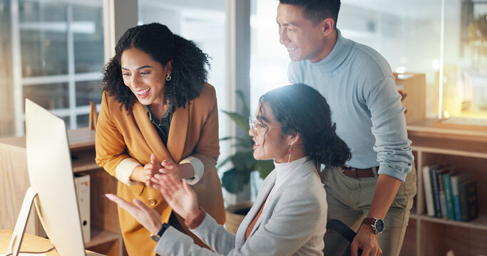 Business, people and celebrate for teamwork success, support and collaboration with computer in office. Celebration, man and women happy together with pride or congratulations for work feedback