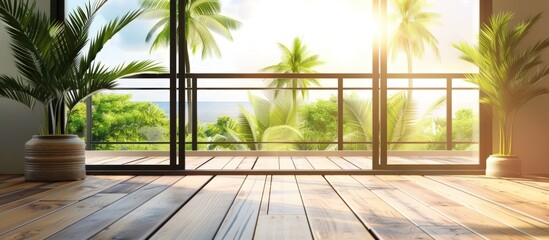Beautiful summer landscape of coconut tree with sunlight from wooden balcony patio deck at daylight.