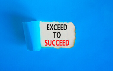 Exceed to succeed symbol. Concept words Exceed to succeed on beautiful white paper. Beautiful blue paper background. Business and exceed to succeed concept. Copy space.