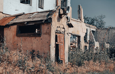 destroyed houses in an abandoned city without people in Ukraine