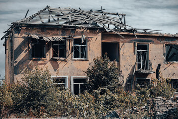 destroyed houses in an abandoned city without people in Ukraine