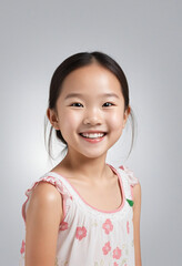 Cheerful Asian child girl isolated on white background