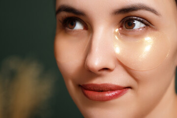 Under eye masks for puffiness, wrinkles, dark circles. Eye patches concept. Close-up portrait of...