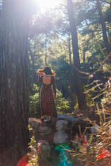 Concept of balance, harmony and health. girl alone with nature. a girl dances and sings in the...