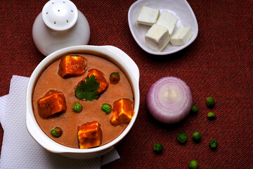 Paneer Butter Masala, served with or without roti and rice, popular indian lunch / dinner menu in weddings or parties.