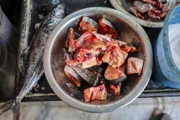 fresh fish cutting at retail shop for sale at day from different angle