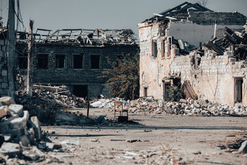 destroyed houses in an abandoned city without people in Ukraine