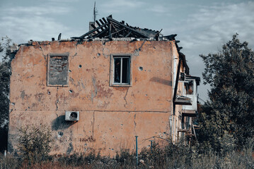 destroyed houses in an abandoned city without people in Ukraine