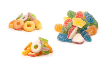 Assorted gummy candies isolated on a white background. Top view.