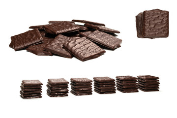 Dark chocolate candies isolated on white background.