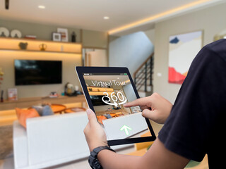 Virtual tour 360 for real estate technology concept.Man hands holding digital tablet - obrazy, fototapety, plakaty